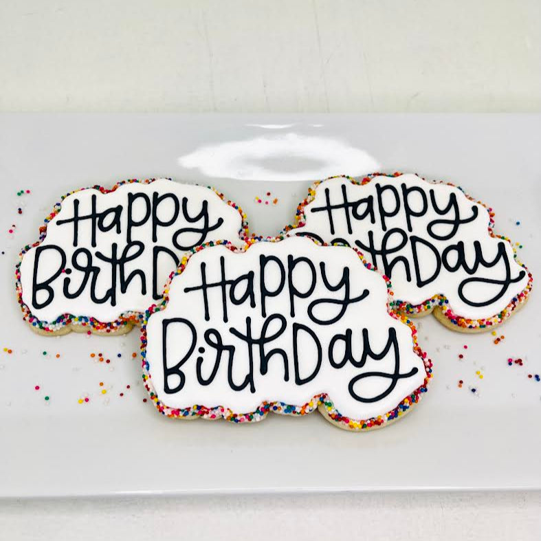 Three cookies with Happy Birthday Writing and sprinkles border