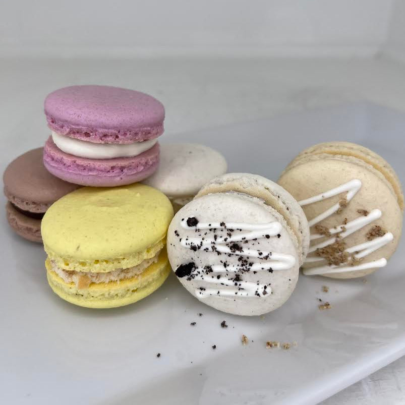 Assorted macarons on a white plate